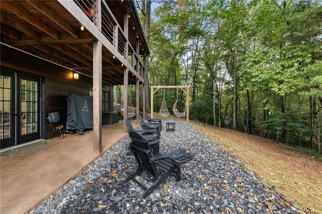 120 Brookhaven Trail Blue Ridge, GA 30513 - Photo 70 of 100 a backyard of a house with outdoor seating
