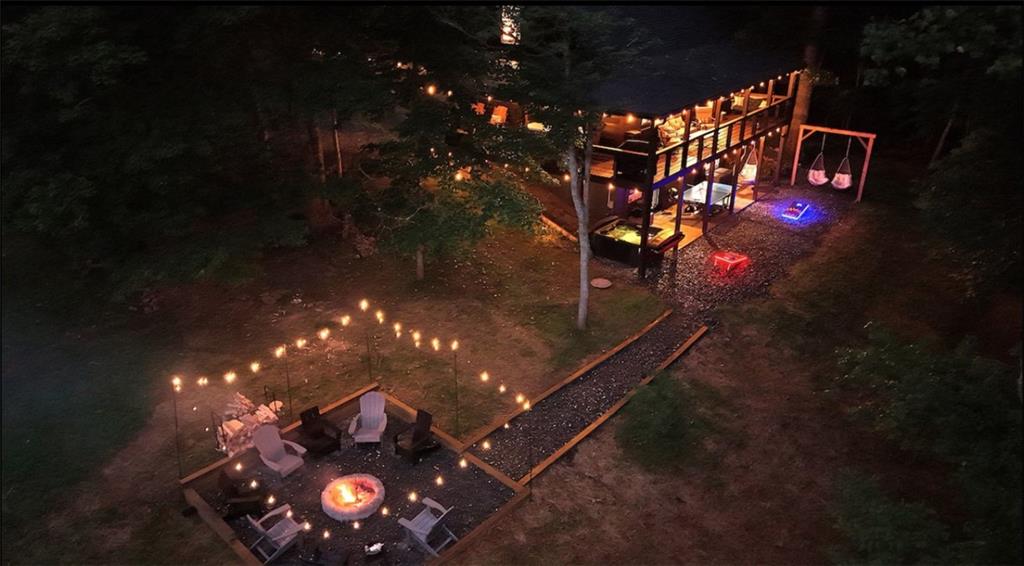 120 Brookhaven Trail Blue Ridge, GA 30513 - Photo 92 of 100 a lamp that is sitting in the middle of a yard