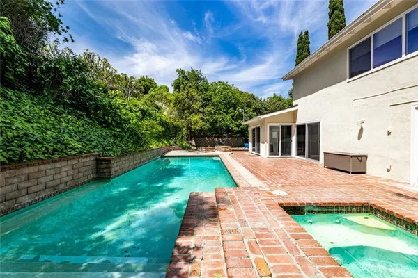 a view of outdoor space yard and swimming pool