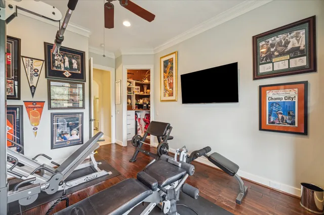 a bedroom with a large bed and a large window