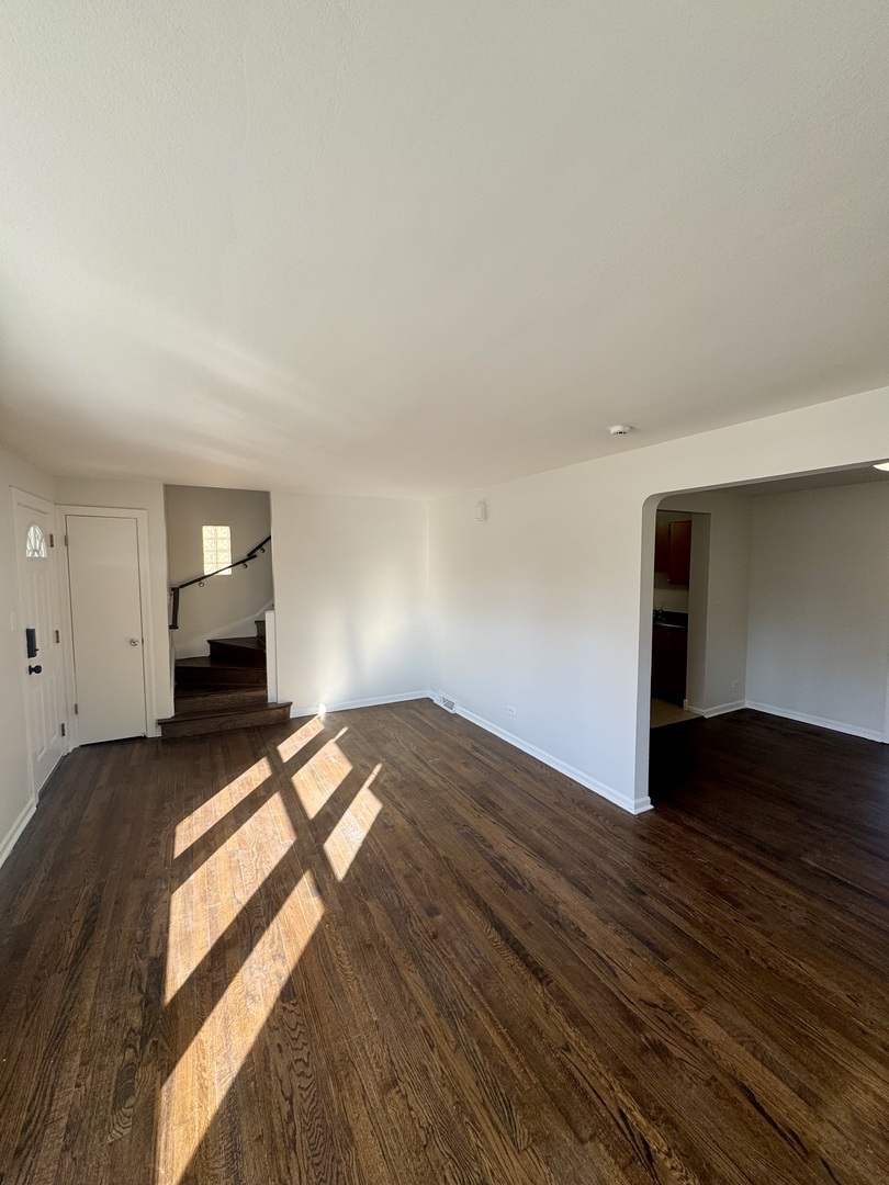 3338 West 83rd Place Chicago, IL 60652 - Photo 3 of 26 a bedroom with a bed and window