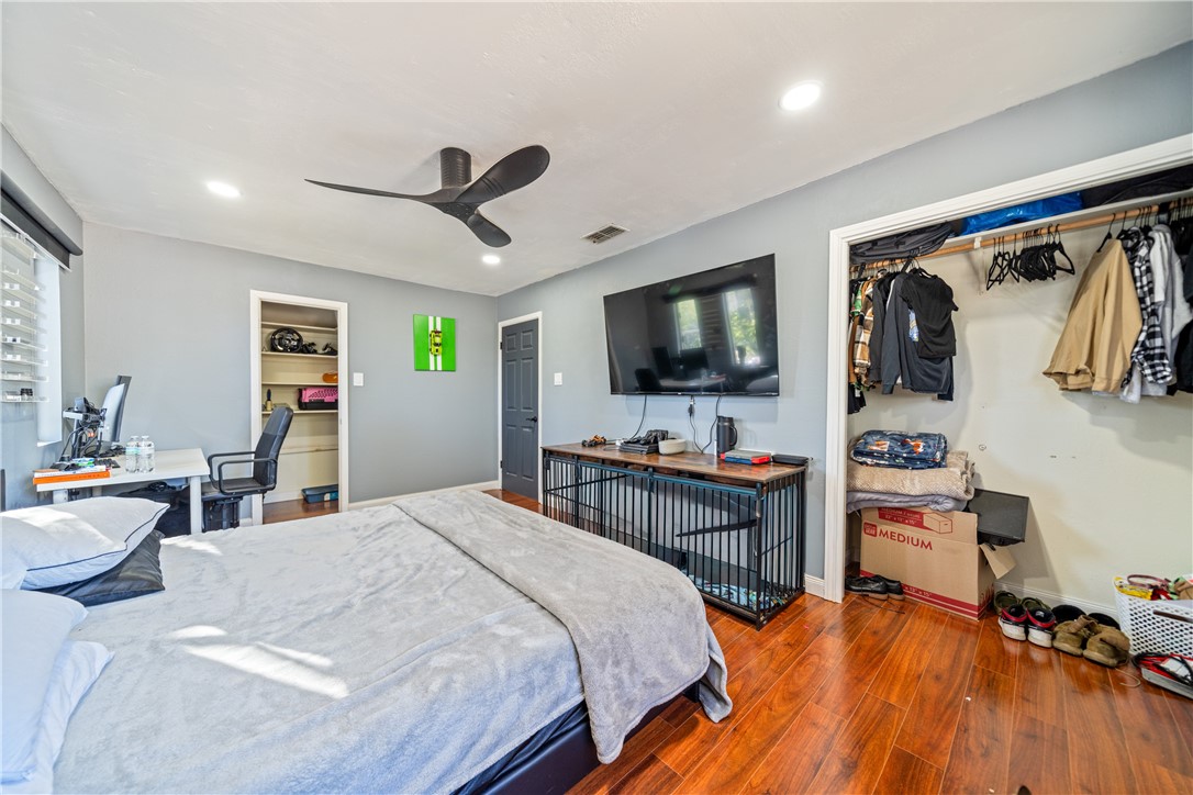 2217 Post Oak Drive Portland, TX 78374 - Photo 29 of 39 a bedroom with a bed and a flat screen tv