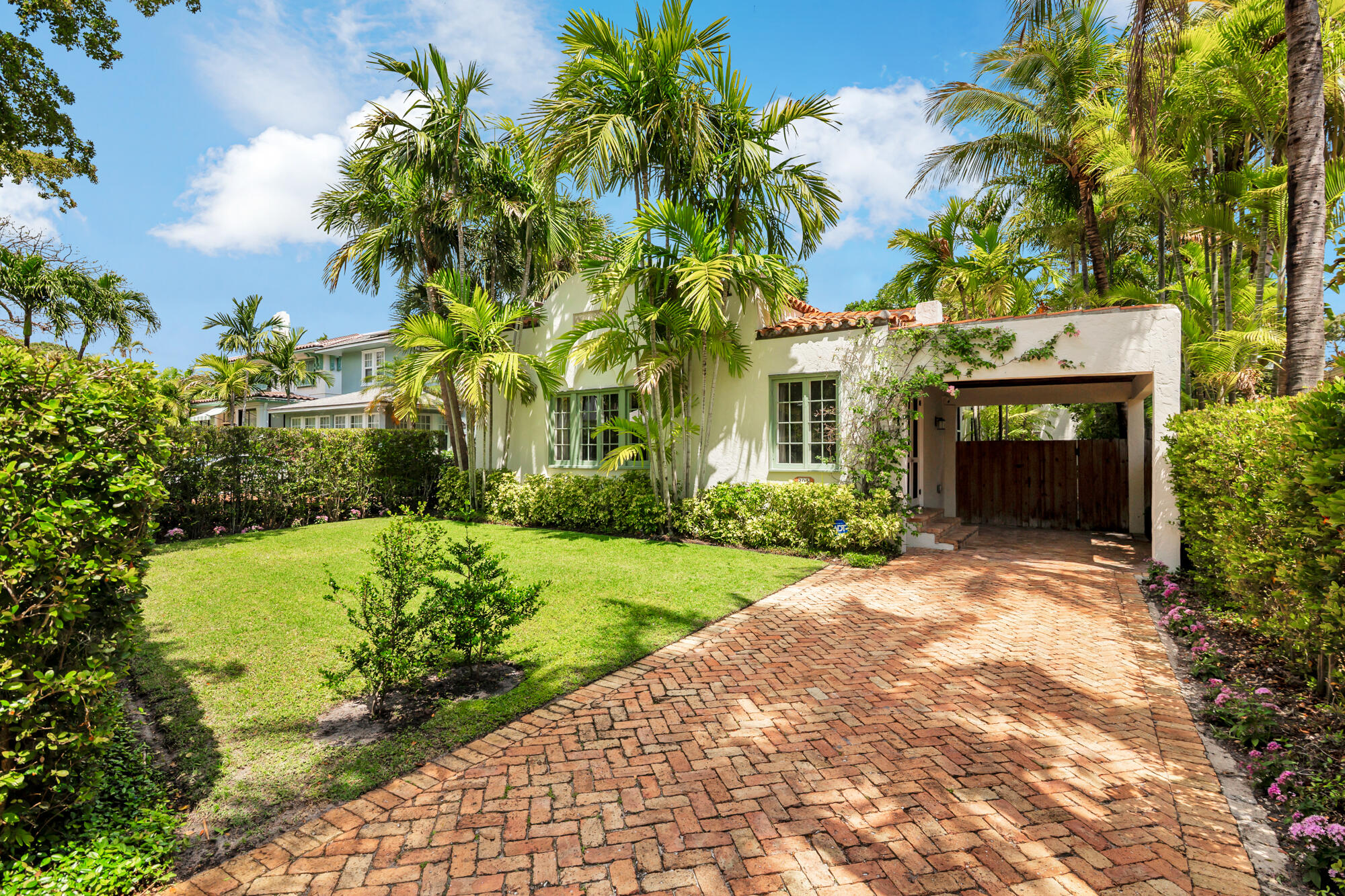 205 Westminster Road West Palm Beach, FL 33405 - Photo 1 of 37 a front view of a house with a yard