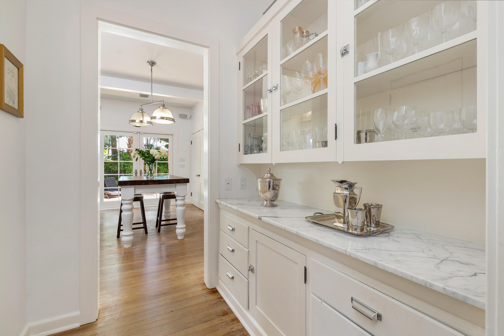 205 Westminster Road West Palm Beach, FL 33405 - Photo 11 of 37 a hallway with cabinets and window