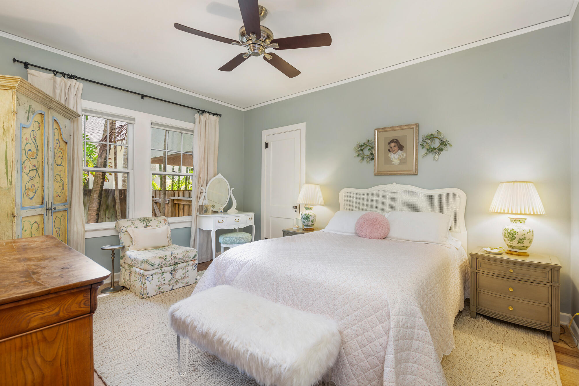 205 Westminster Road West Palm Beach, FL 33405 - Photo 16 of 37 a bedroom with a bed a couch and dresser