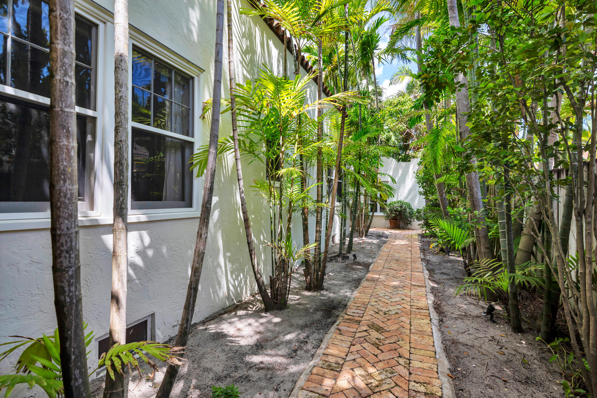 205 Westminster Road West Palm Beach, FL 33405 - Photo 26 of 37 a view of a pathway with plants