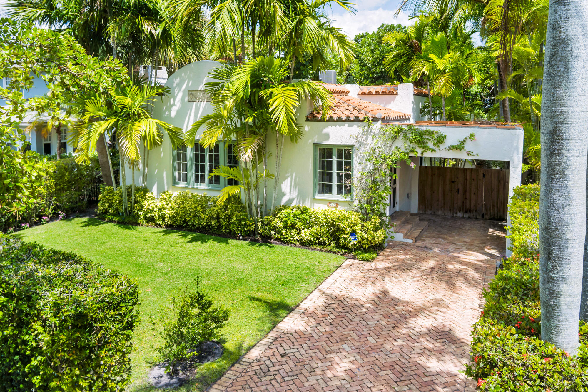205 Westminster Road West Palm Beach, FL 33405 - Photo 27 of 37 a view of a house with a yard
