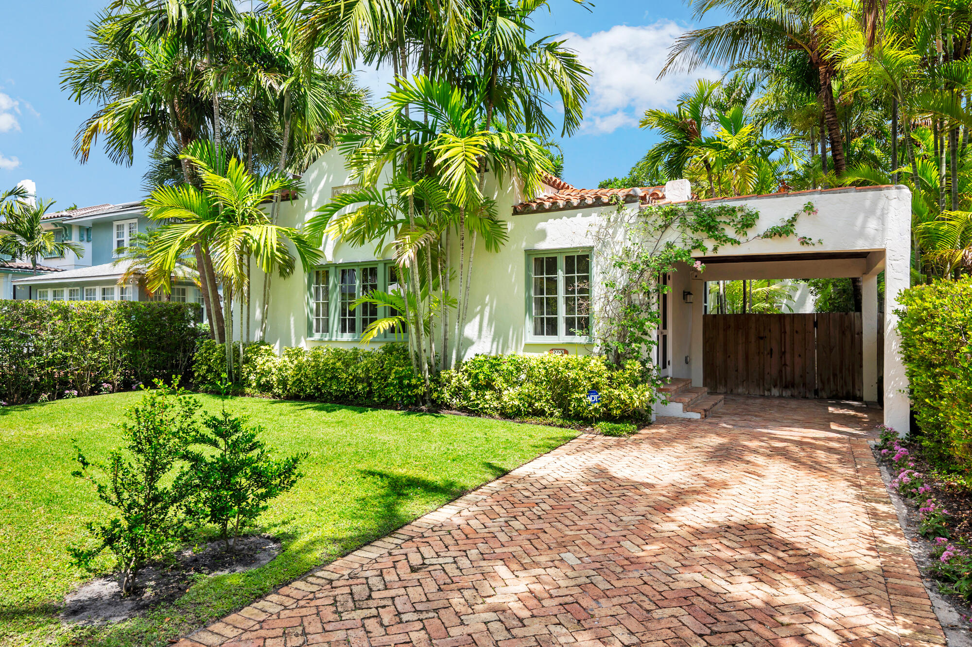 205 Westminster Road West Palm Beach, FL 33405 - Photo 29 of 37 a front view of a house with a yard