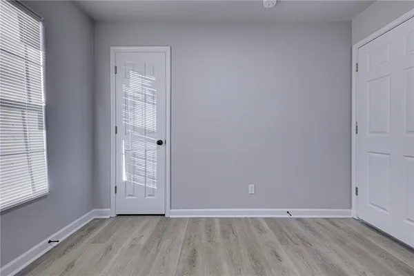 an empty room with window