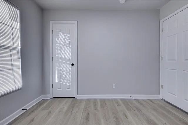 an empty room with window