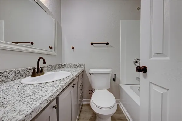 a bathroom with a sink and a toilet