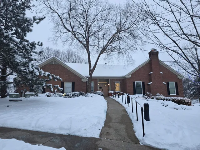 a view of a house with a snow