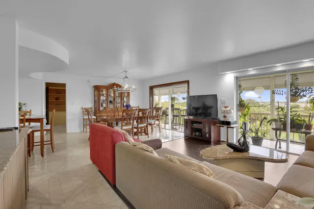 a bunch of flowers in front of a window