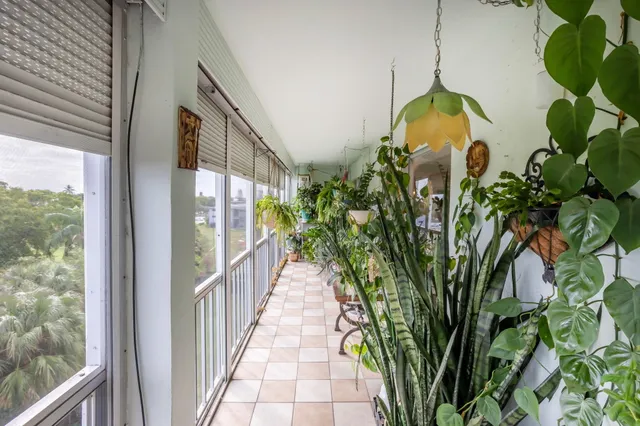 a view of a porch with seating space