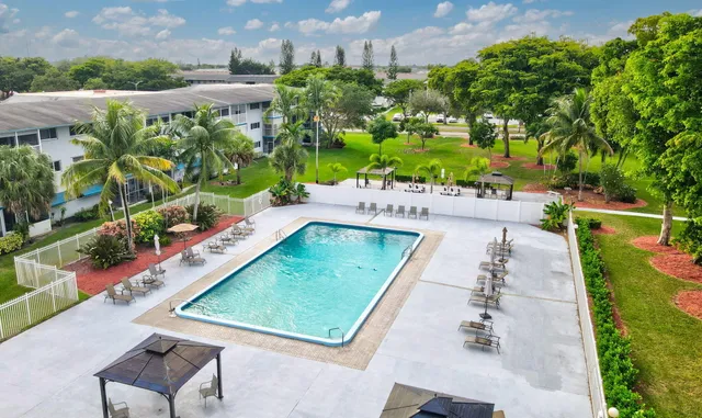 a view of a yard with a patio