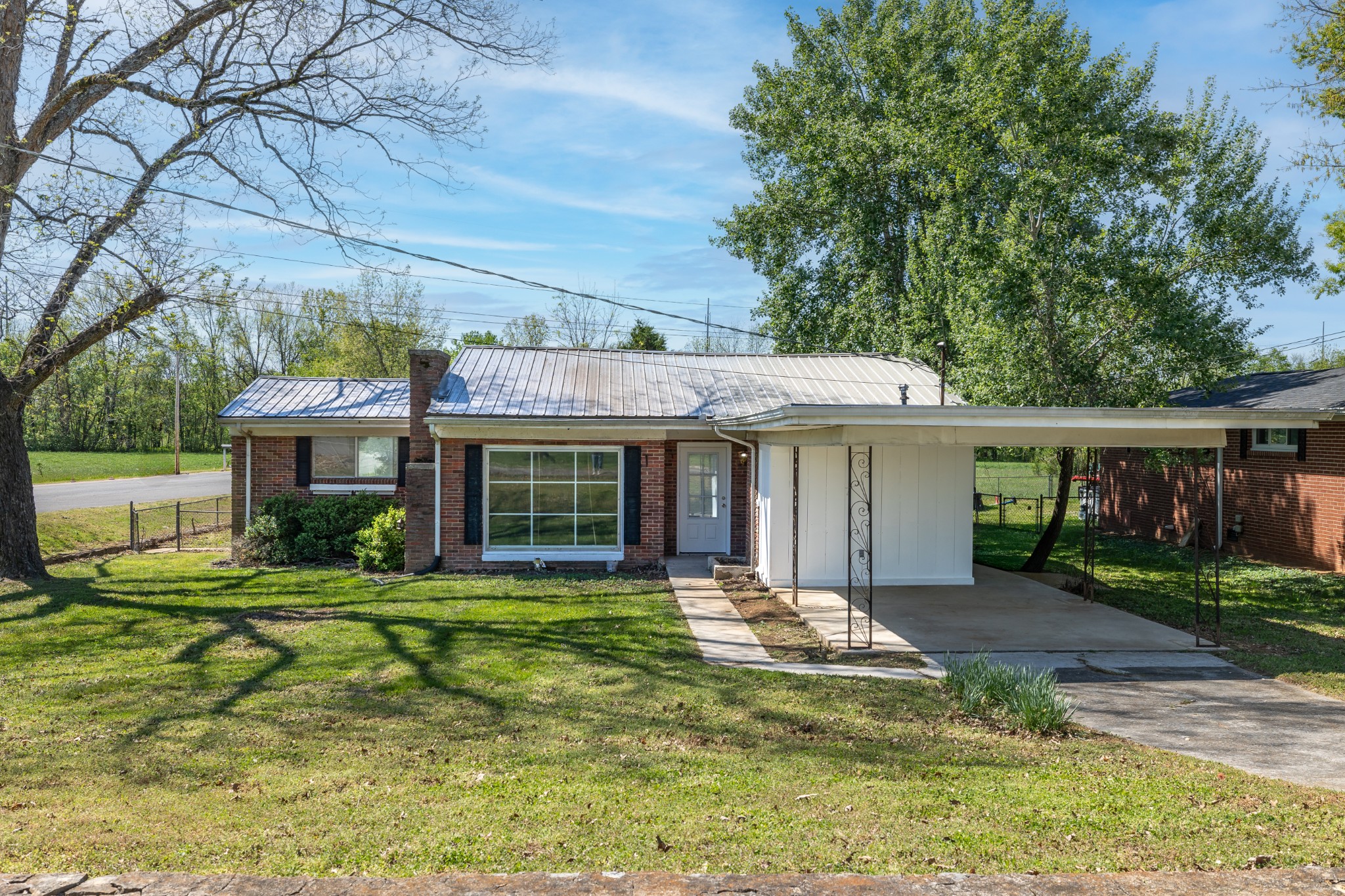 551 Magazine Road Pulaski, TN 38478 - Photo 1 of 25 a view of a house with a yard porch and sitting area