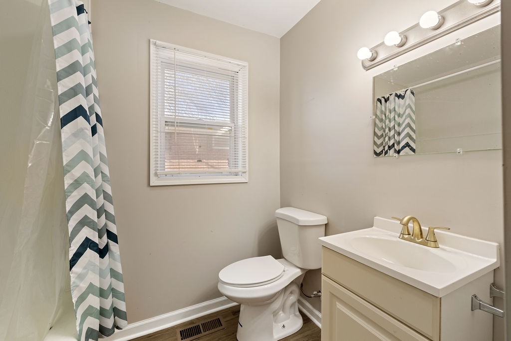 551 Magazine Road Pulaski, TN 38478 - Photo 20 of 25 a bathroom with a sink toilet and a mirror