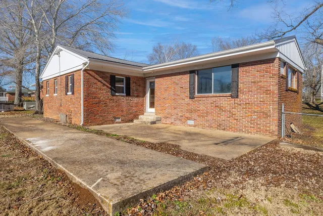a front view of a house with yard