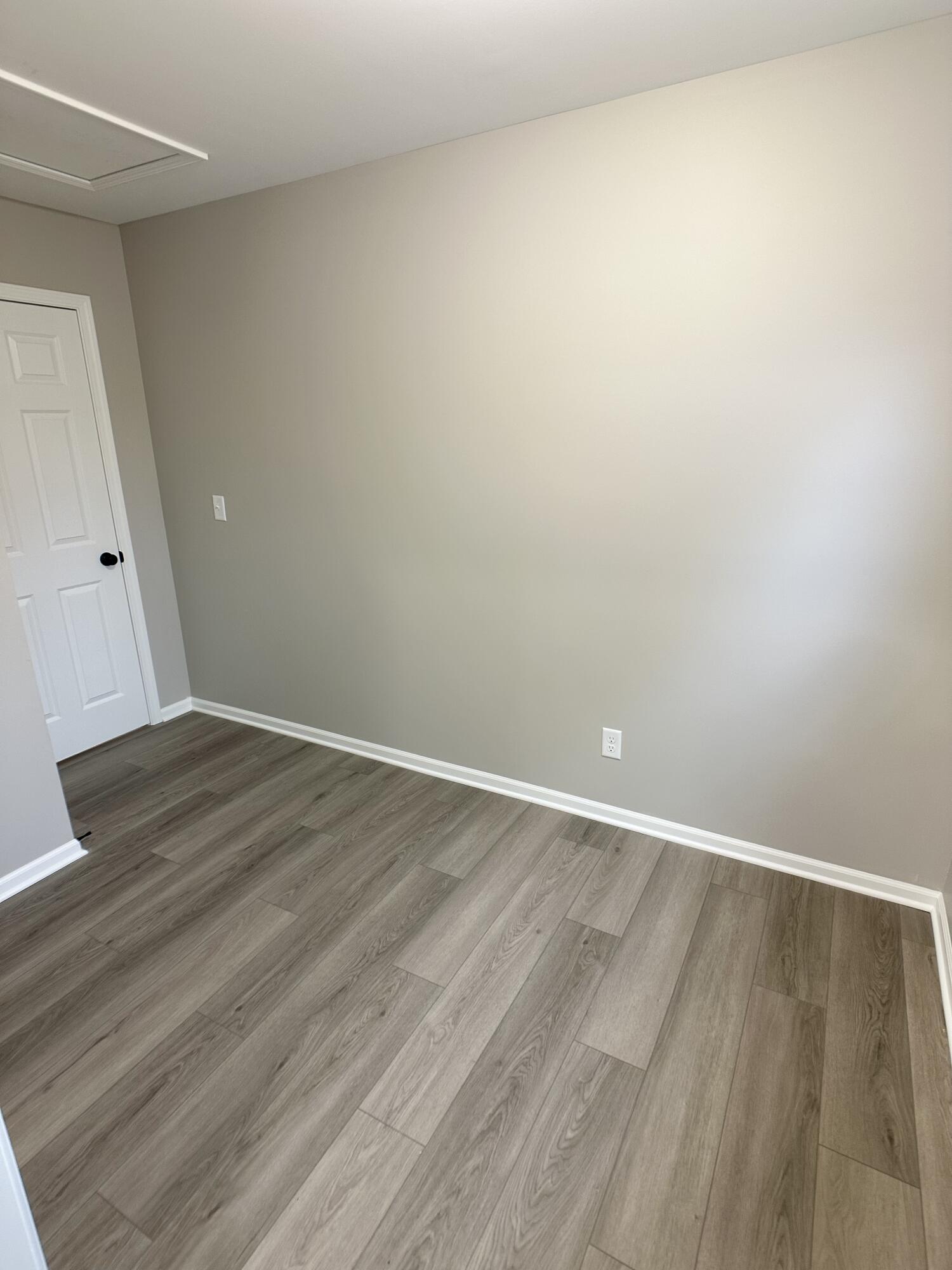 306 Maple Street Crown Point, IN 46307 - Photo 11 of 21 a view of an empty room with wooden floor
