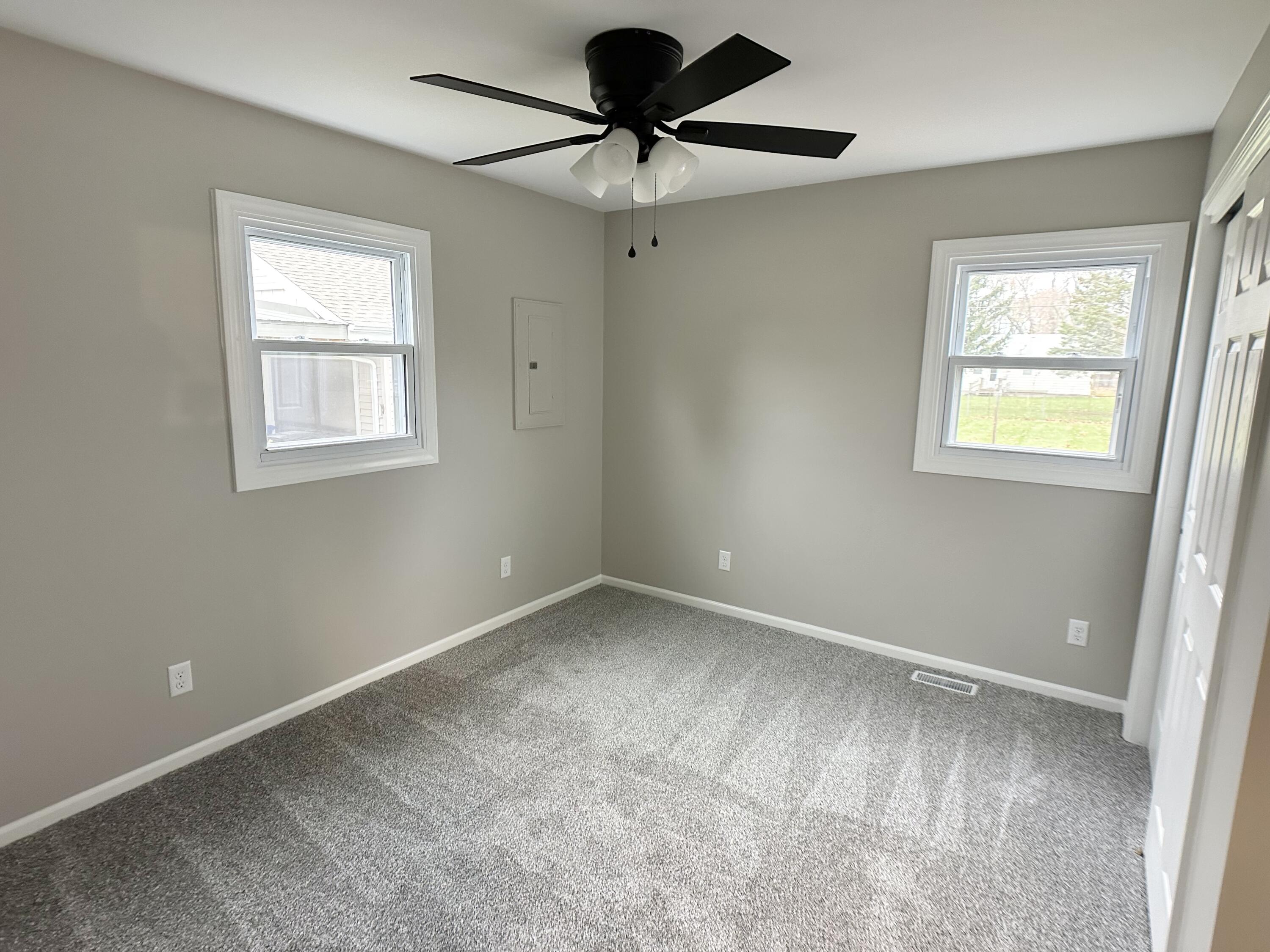 306 Maple Street Crown Point, IN 46307 - Photo 9 of 21 a room that has a window in it