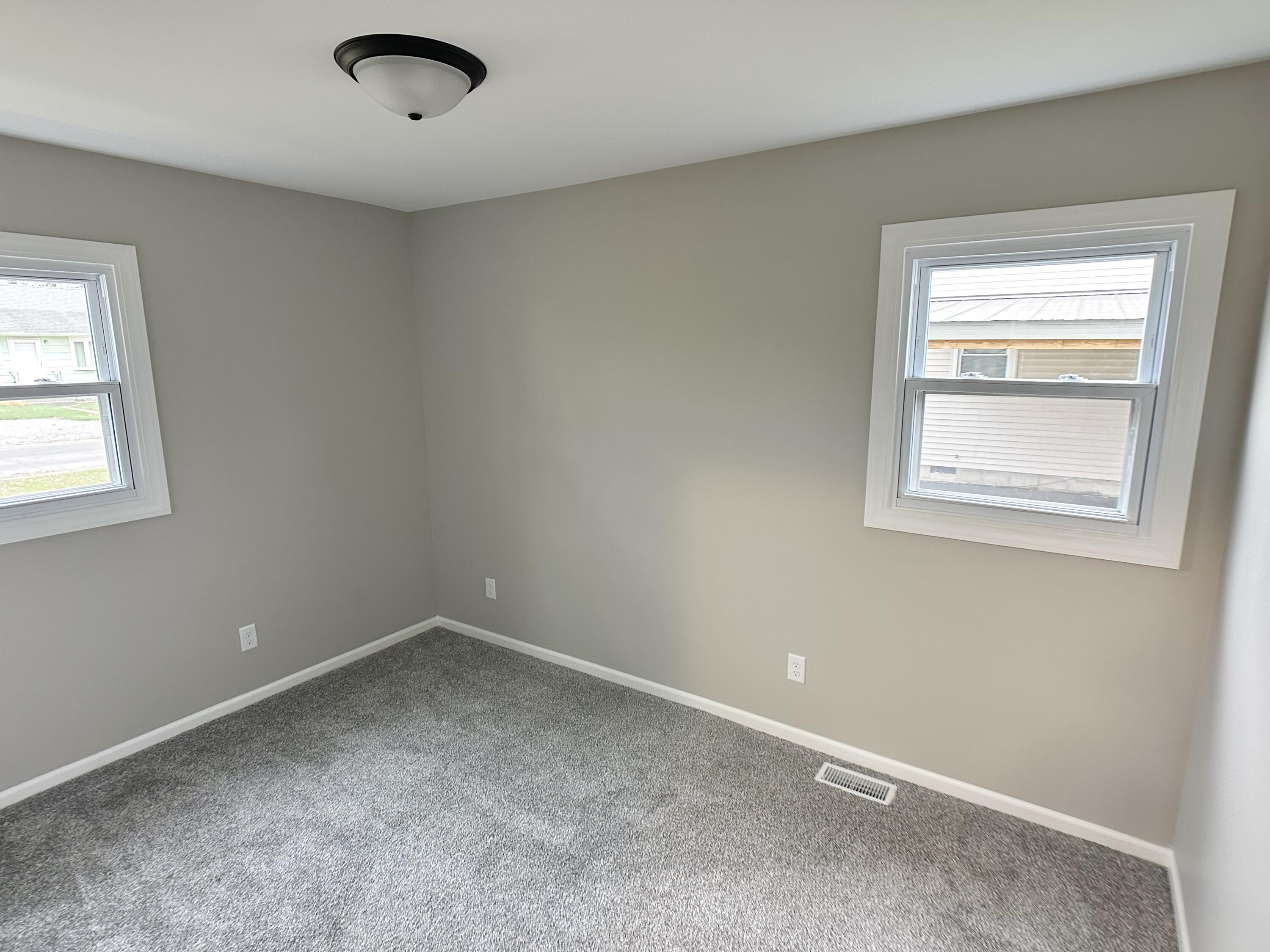 306 Maple Street Crown Point, IN 46307 - Photo 10 of 21 an empty room with a window
