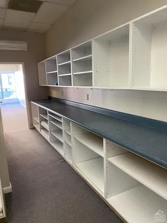 a view of gallery with stairs