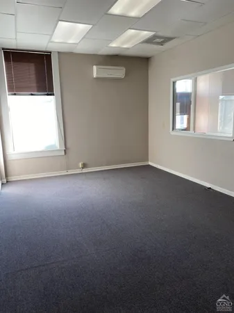 an empty room that has a window