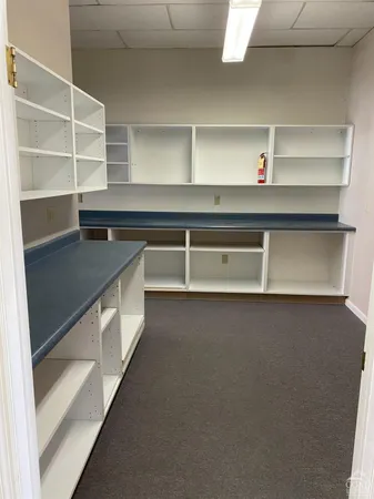 a room with furniture and window