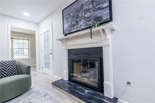 a living room with a fireplace