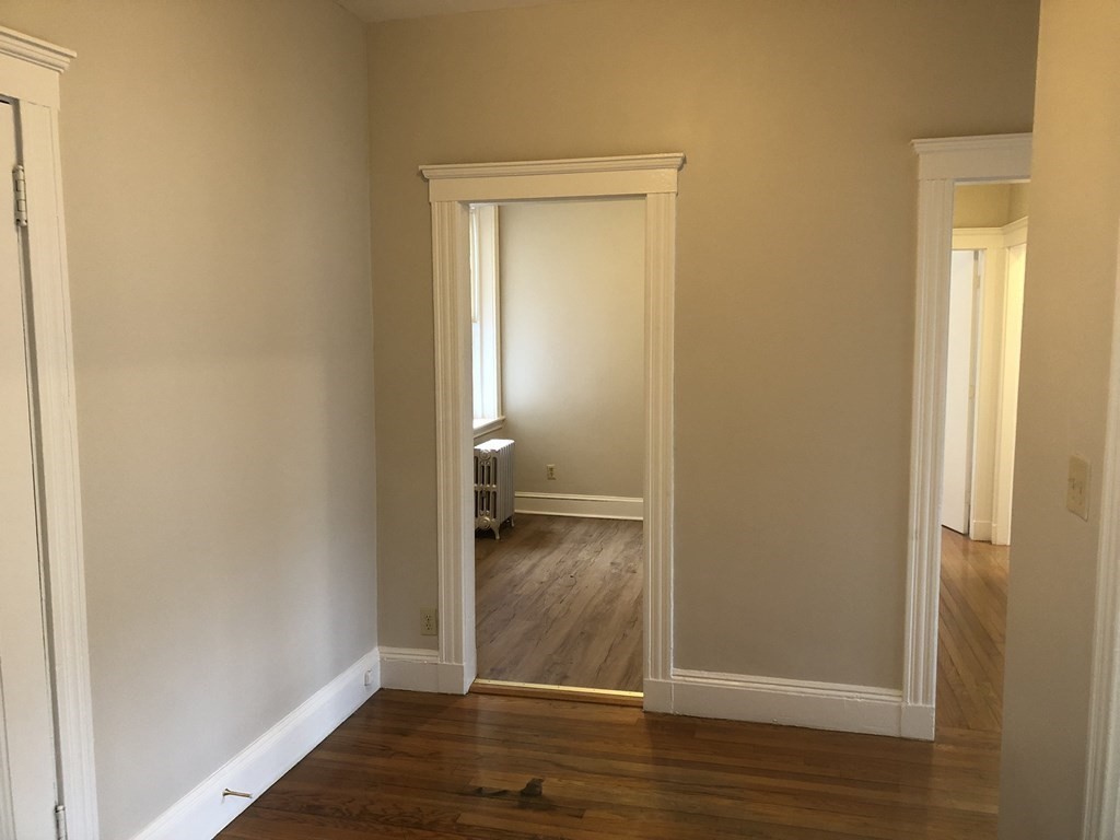 11 Perkins Square, Unit 11 Boston, MA 02130 - Photo 6 of 12 a view of wooden floor