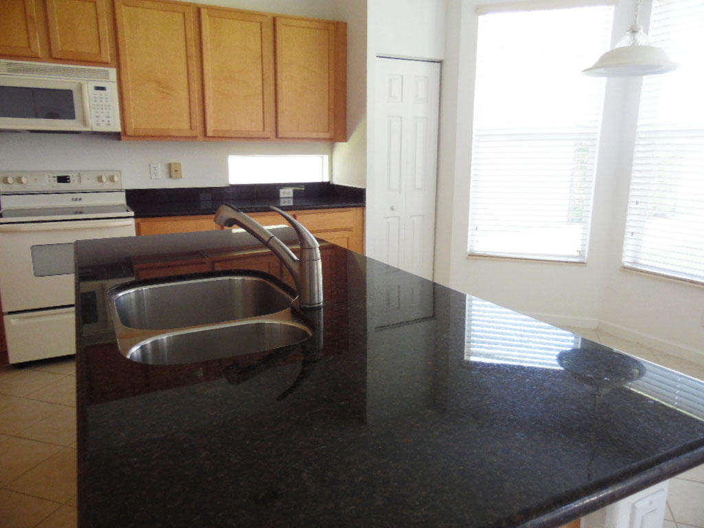 1045 Center Stone Lane Riviera Beach, FL 33404 - Photo 4 of 11 Kitchen Island