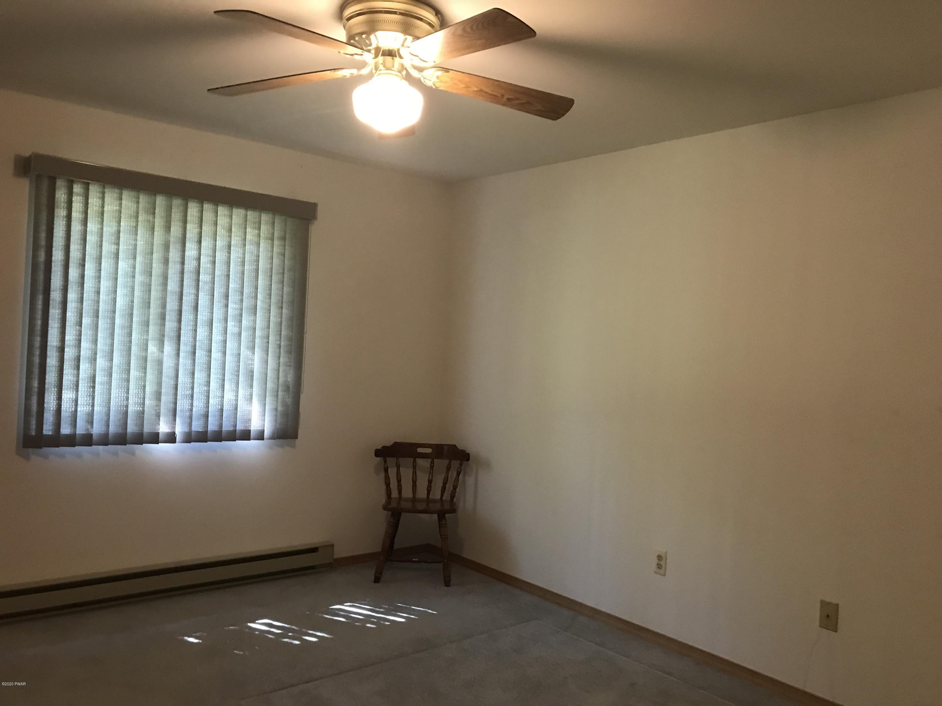 183 Yale Road Milford, PA 18337 - Photo 16 of 26 an empty room with a window