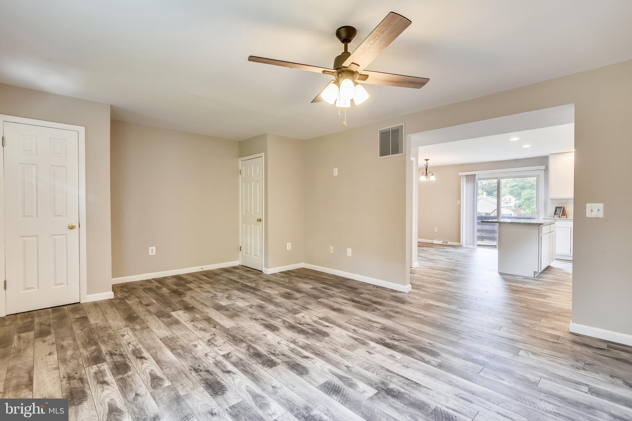 645 Saltzman Road Severna Park, MD 21146 - Photo 4 of 40 Great room looking into open and airy kitchen.