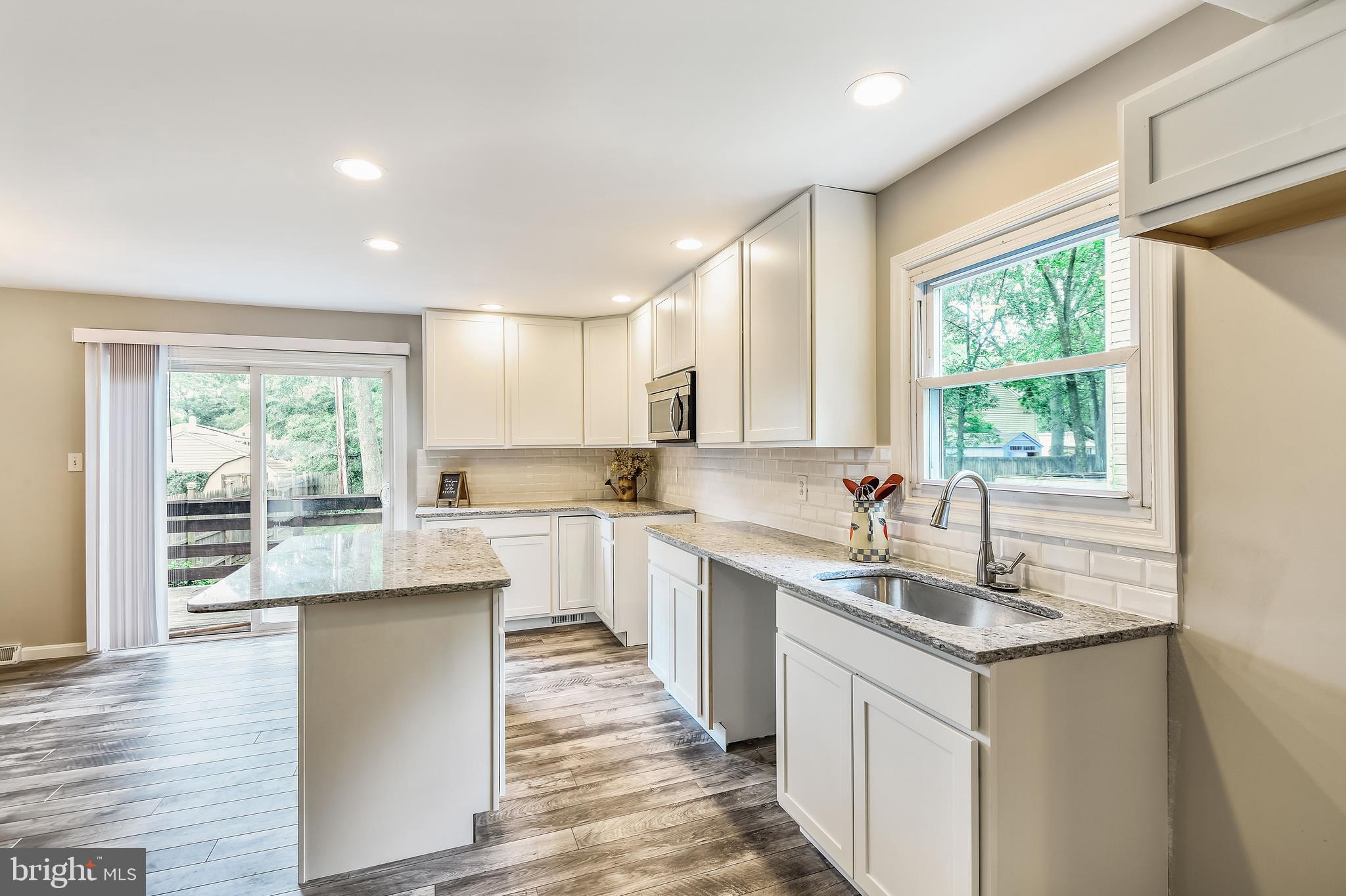 645 Saltzman Road Severna Park, MD 21146 - Photo 7 of 40 Kitchen to include fridge, stove and dishwasher.