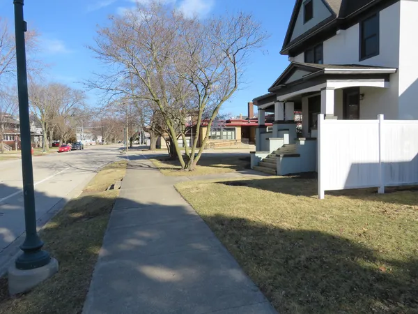 a view of a street with houses