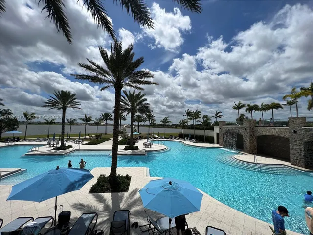 a view of a patio with swimming pool