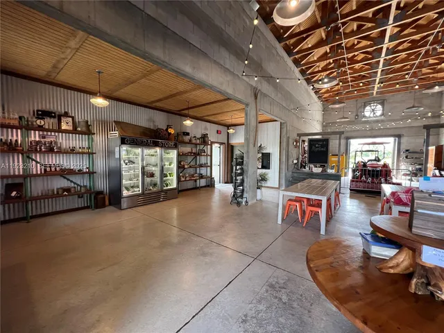a lobby with furniture and a rug