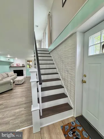 a view of yard with green space and seating area