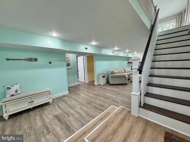 a spacious bathroom with a toilet sink and shower