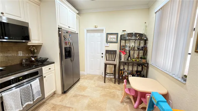 a view of a dining room with furniture