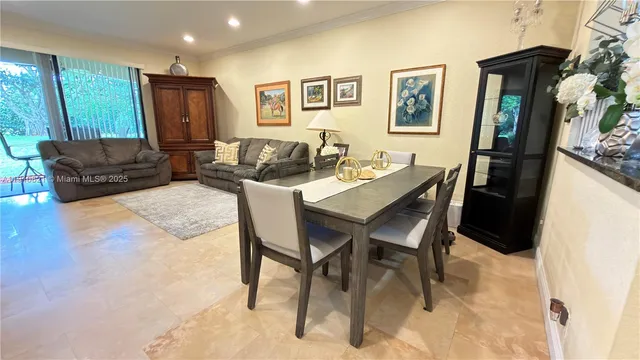a view of a dining room with furniture