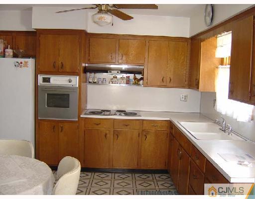 888 Hermann Road North Brunswick, NJ 08902 - Photo 4 of 10 a utility room with sink dryer and washer