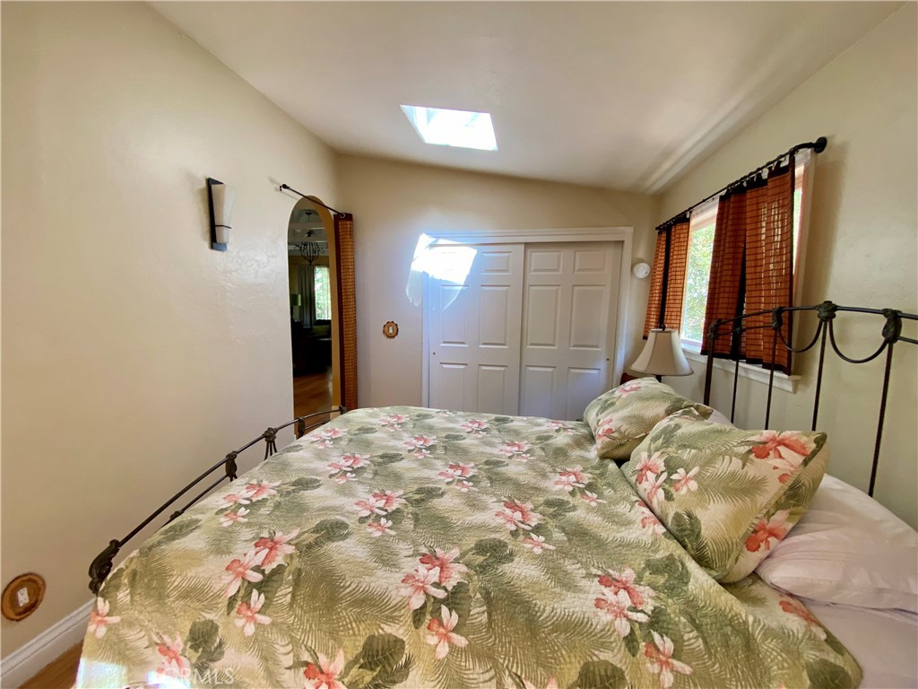 10787 Foothill Road Middletown, CA 95461 - Photo 11 of 23 a bedroom with a bed and a mirror