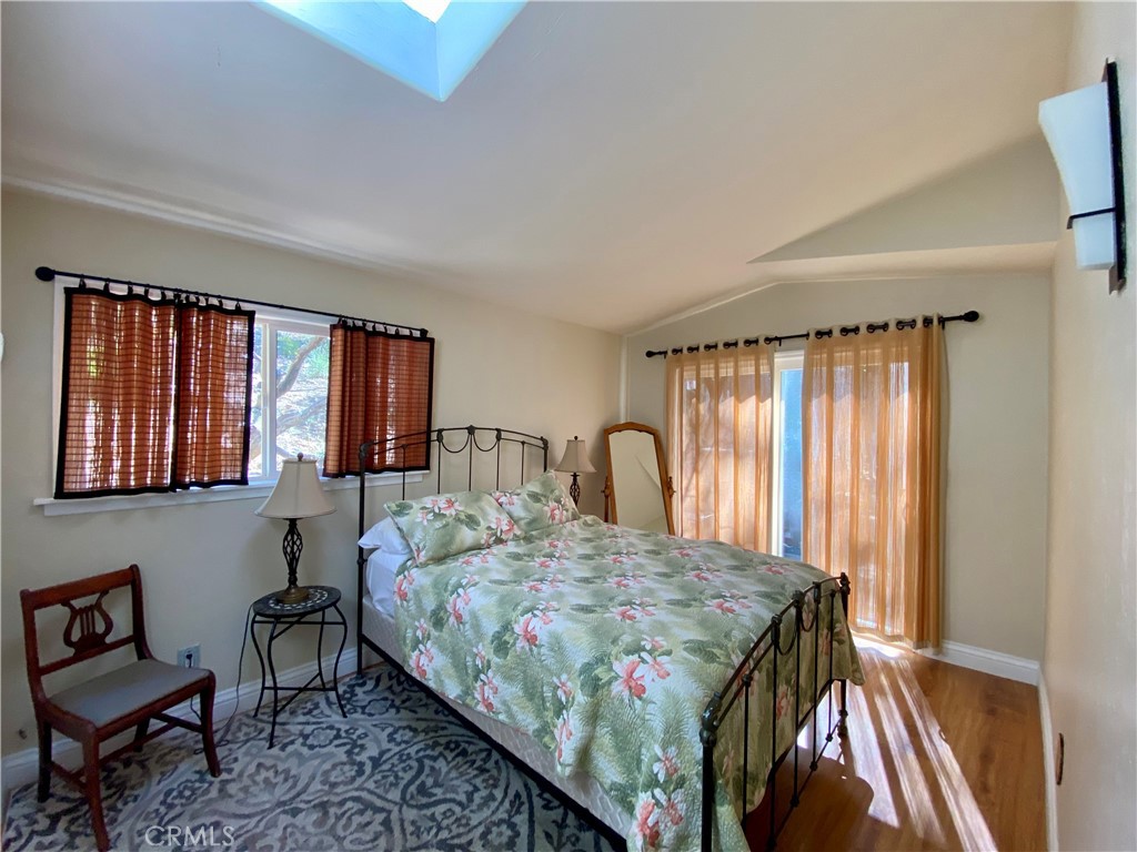 10787 Foothill Road Middletown, CA 95461 - Photo 12 of 23 a bedroom with a bed and a window