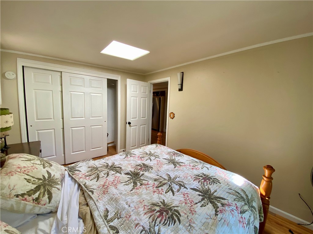 10787 Foothill Road Middletown, CA 95461 - Photo 13 of 23 a bedroom with a bed and a closet
