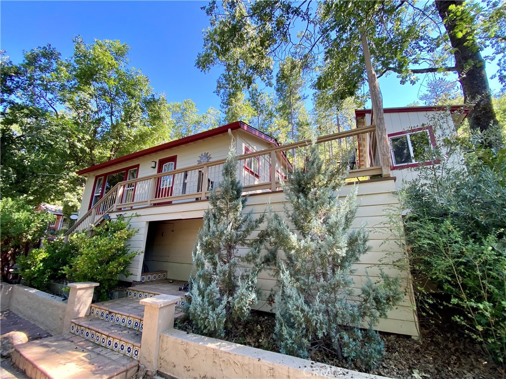 10787 Foothill Road Middletown, CA 95461 - Photo 20 of 23 a view of a house with brick walls and plants