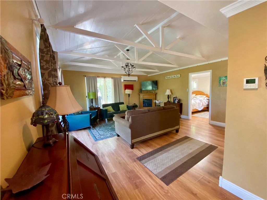10787 Foothill Road Middletown, CA 95461 - Photo 4 of 23 a living room with furniture and a mirror
