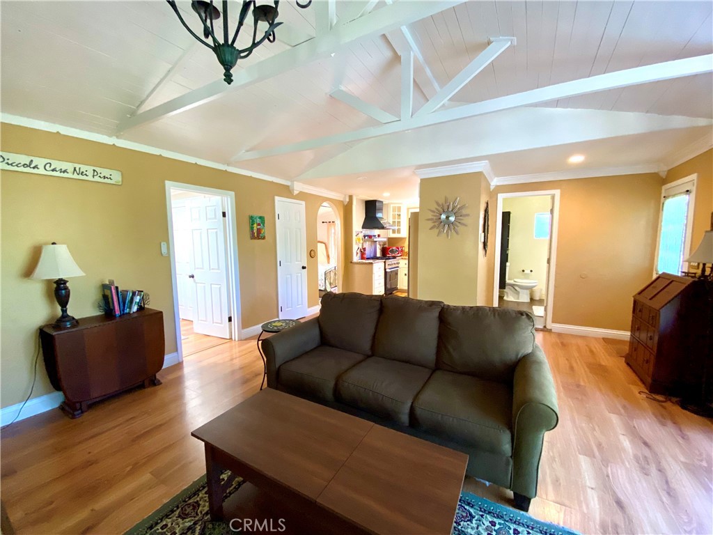 10787 Foothill Road Middletown, CA 95461 - Photo 6 of 23 a living room with furniture and a wooden floor