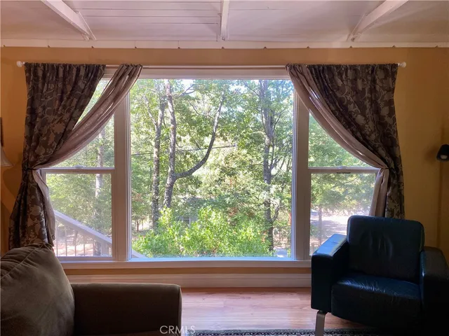 a view of room with furniture and a porch