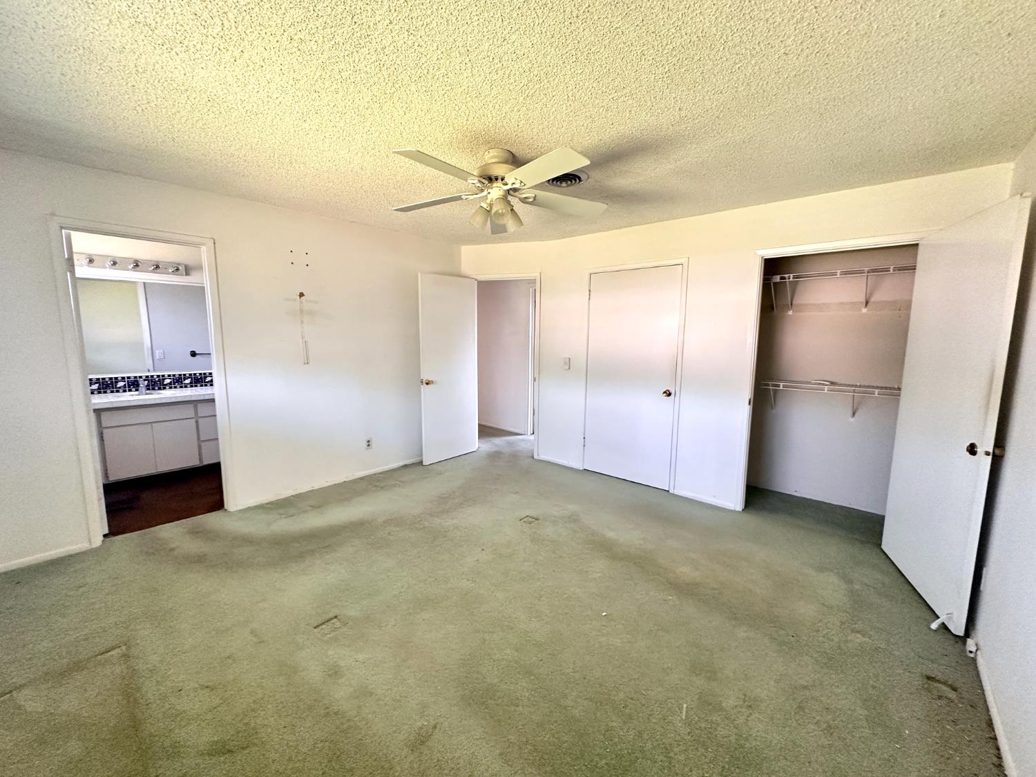 3207 Terry Way Carmichael, CA 95608 - Photo 24 of 36 an empty room with a bathroom and a sink